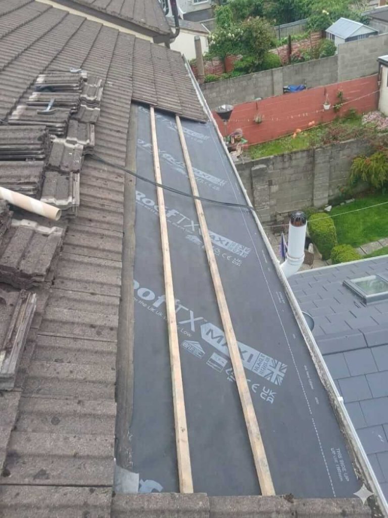 fixing a leak on a roof